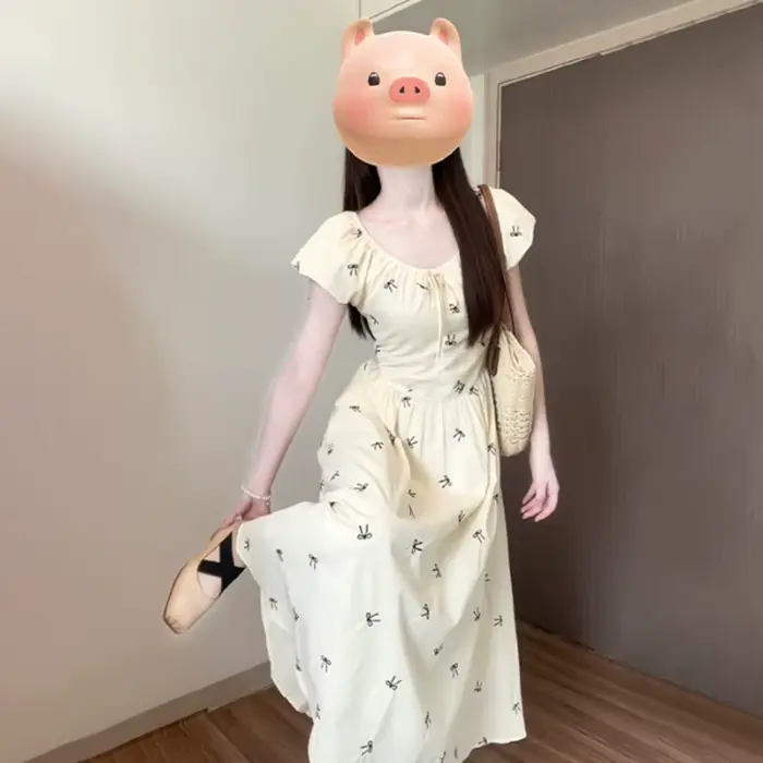 Robe longue imprimée nœud français pour femme été 2026 style à la française coupe trapèze manches bouffantes occasion spéciale vacances