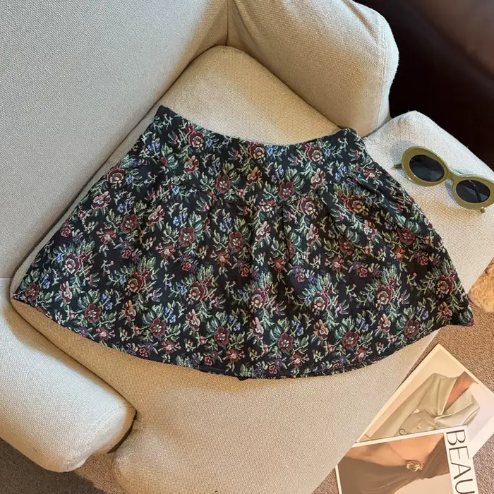 Jupe mini plissée taille haute style rétro français, élégante et populaire, à motif floral, coupe tr