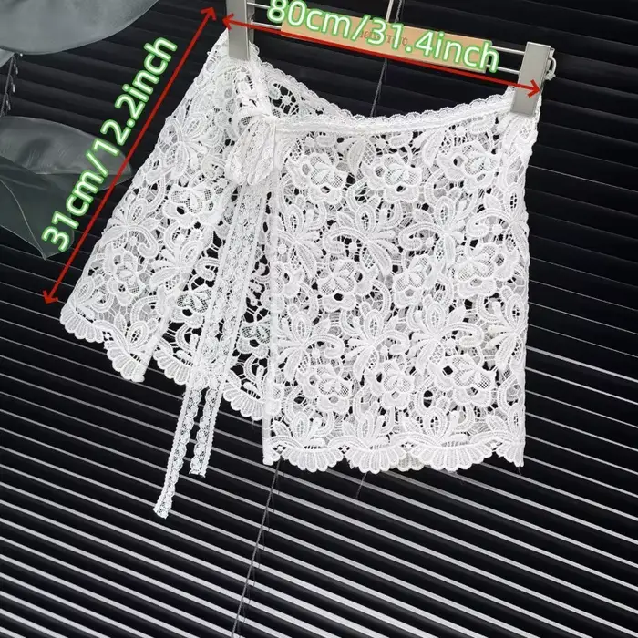 Jupe cache-hanches en dentelle à volants