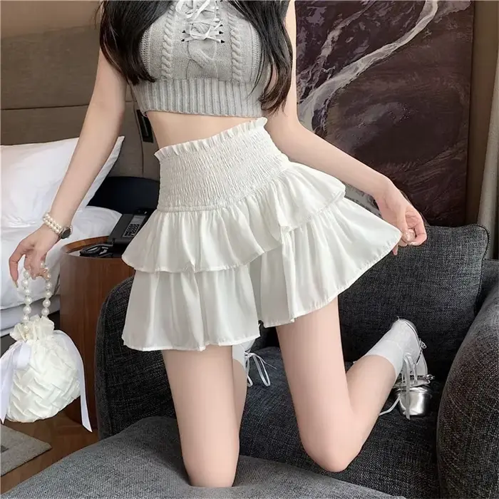 Printemps gâteau jupes plissées pour les femmes blanc nouvelle jupe courte été coréen à volants taille élastique