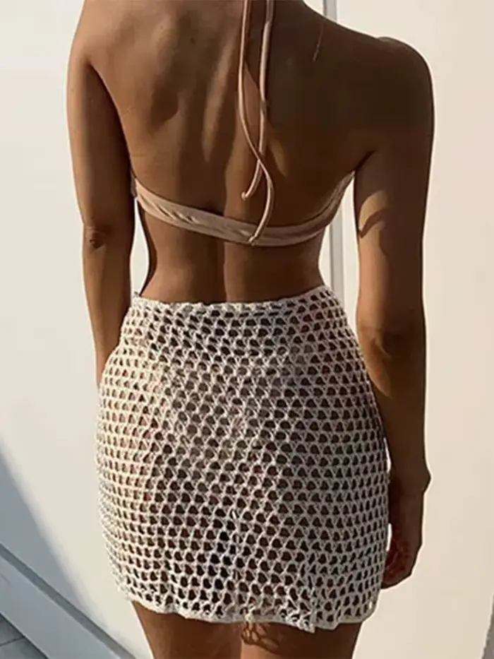 Jupe de plage hirigin tricotée mini ajustée pour femmes, solide, polyvalente, résistante à l'eau, style de plage, polyester, élasthanne, printemps 2025, occasions estivales et spéciales