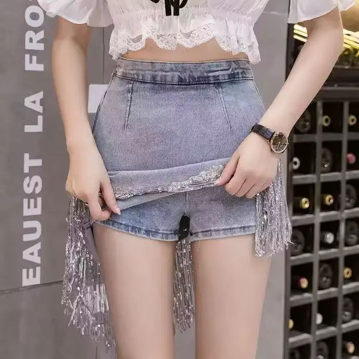 Jupe en jean bleu ciel style anglais avec détails en paillettes et glands pour femmes, mini longueur, tour de taille empire, légèrement extensible, saison printemps/été