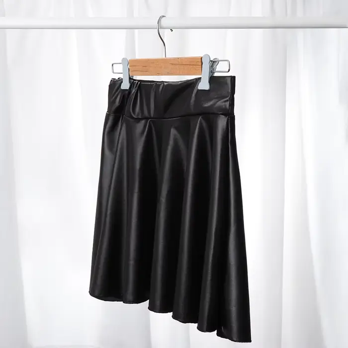 Mode chaude patineuse polyvalente élastique Faux cuir jupes jupe courte Mini taille haute