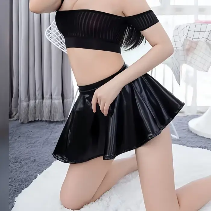Mode coréenne taille haute en cuir noir a-ligne jupes plissées Sexy portefeuille hanches courte Mini jupe pour les femmes boîte de nuit vêtements de rue