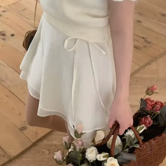 Nouvelle jupe courte en dentelle polyvalente pour filles, coupe trapèze, effet rajeunissant, été 202