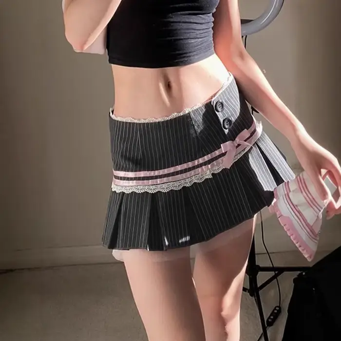 Jupe plissée en tissu de costume de ballet à rayures contrastées avec nœud et dentelle