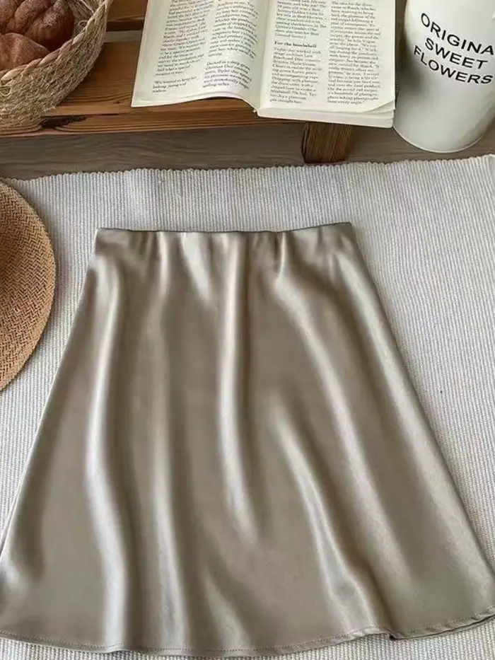 Nouvelle jupe mini élégante en satin taille haute coupe trapèze style coréen couleur champagne pour 