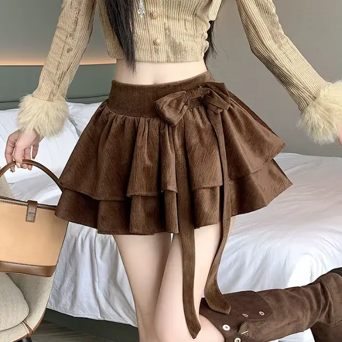 Jupe courte évasée à double couche et volants pour femme, style doux, taille haute avec nœud, collec