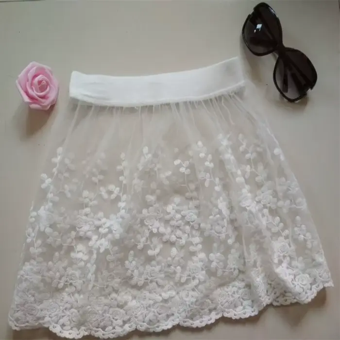 Jupon court taille haute en dentelle transparente brodé de fleurs pour femme