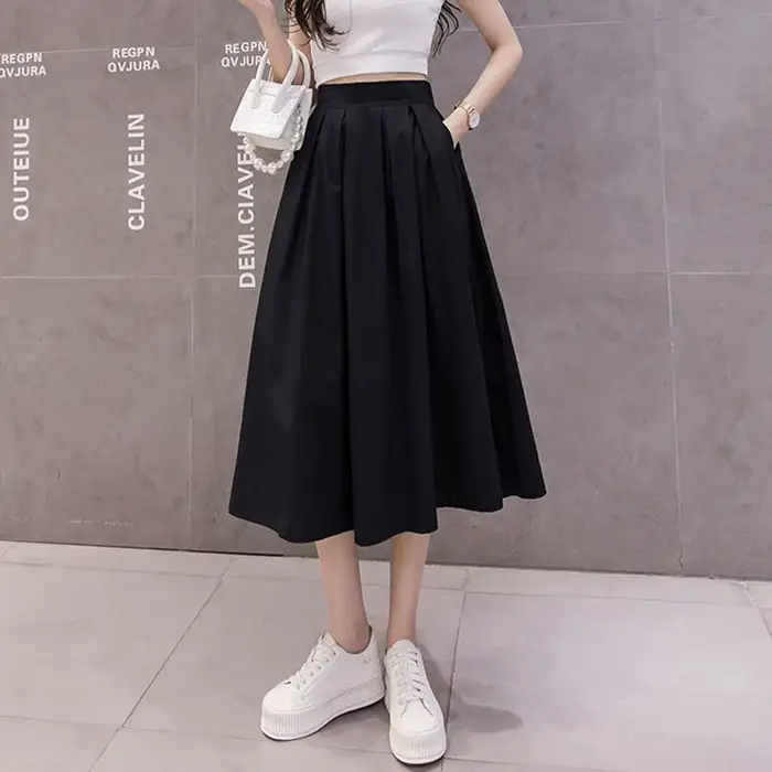 Jupes plissées unies pour femmes en polyester ample et décontractées à poches contrastantes pour les occasions estivales et décontractées