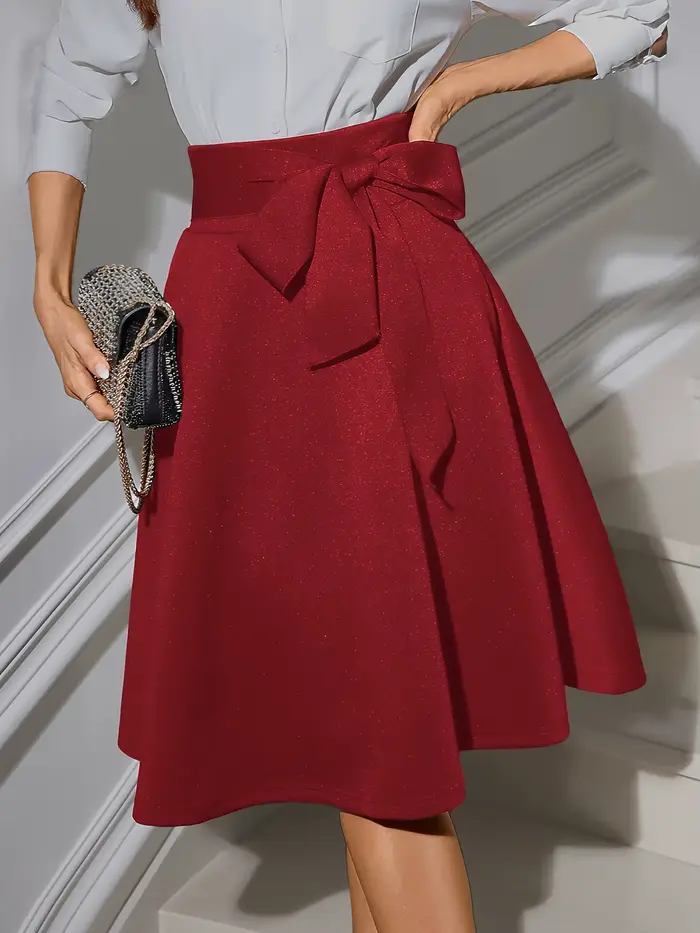 Jupe midi évasée élégante pour femme à taille haute avec ceinture à nœud, coupe inclusive, tissu tri