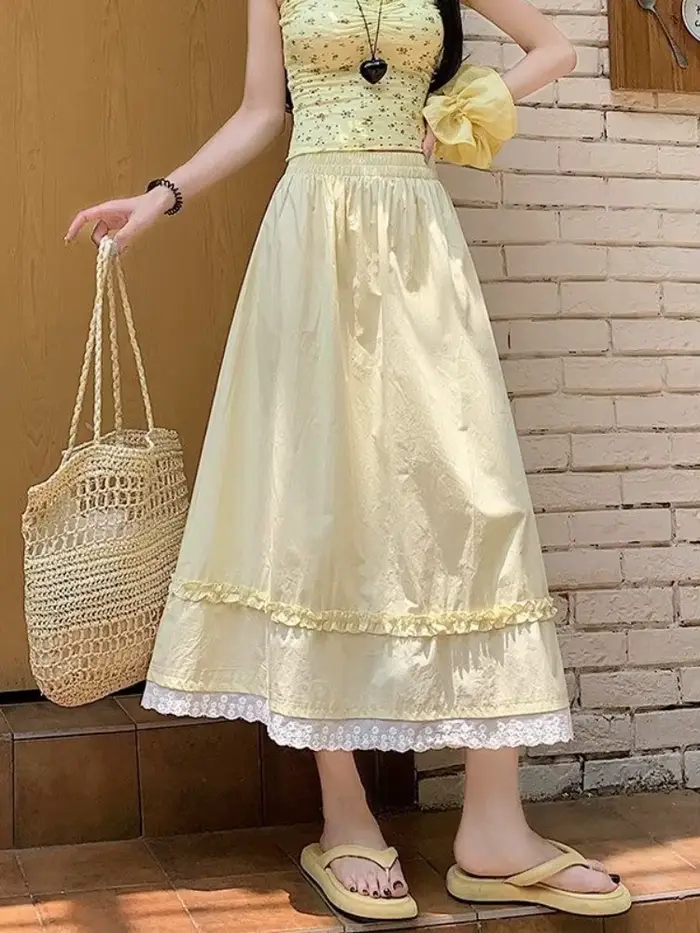 Jupe longue taille haute style coréen pour femme été 2026 jaune avec dentelle douce coupe parapluie élastique large pour toutes les occasions élégante à offrir