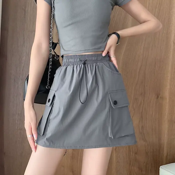 Jupe de travail pour femme à taille élastique et cordon de serrage, nouveau style d'été, mini-jupe t