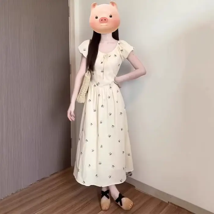 Robe longue imprimée nœud français pour femme été 2026 style à la française coupe trapèze manches bouffantes occasion spéciale vacances