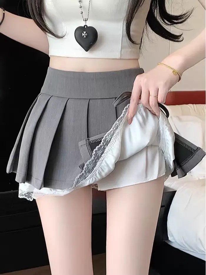 Jupe-short plissée avec dentelle intégrée mini-jupe taille haute élégante avec nœud et fente pour femmes occasions spéciales été printemps