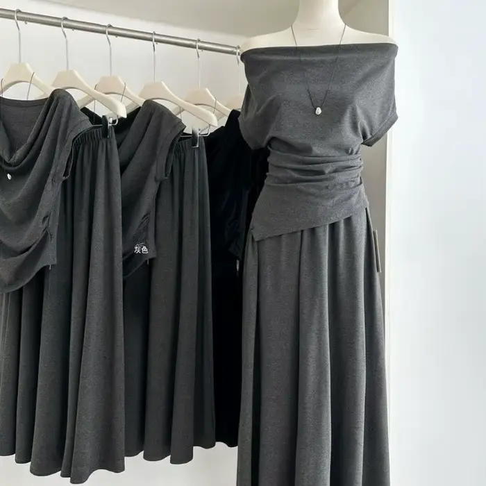 Ensemble deux pièces style coréen pour femme : haut asymétrique et jupe midi taille haute