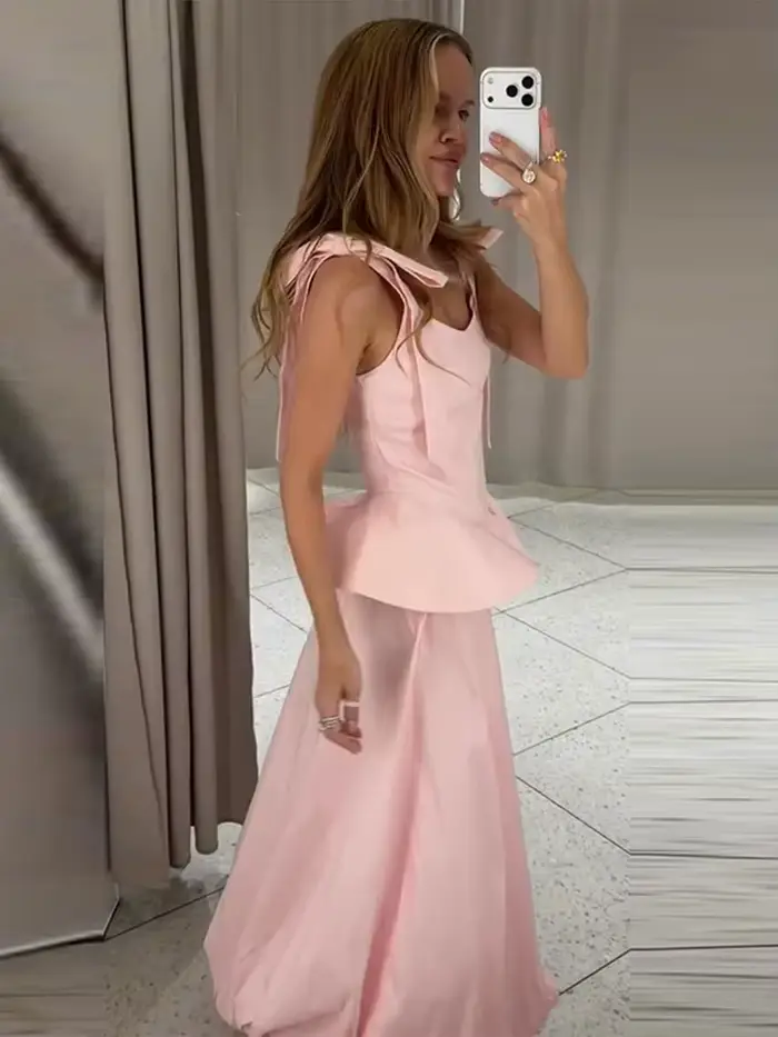 Ensemble jupe longue bouffante et haut à lacets rose avec nœud