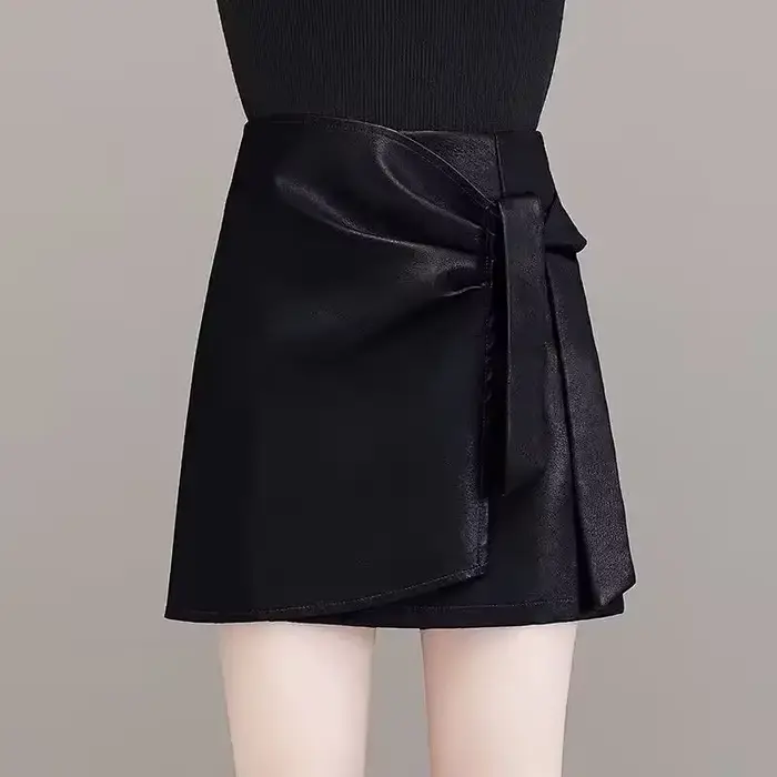 Mini-jupe en similicuir pour femme, style portefeuille, taille à nouer, ourlet asymétrique