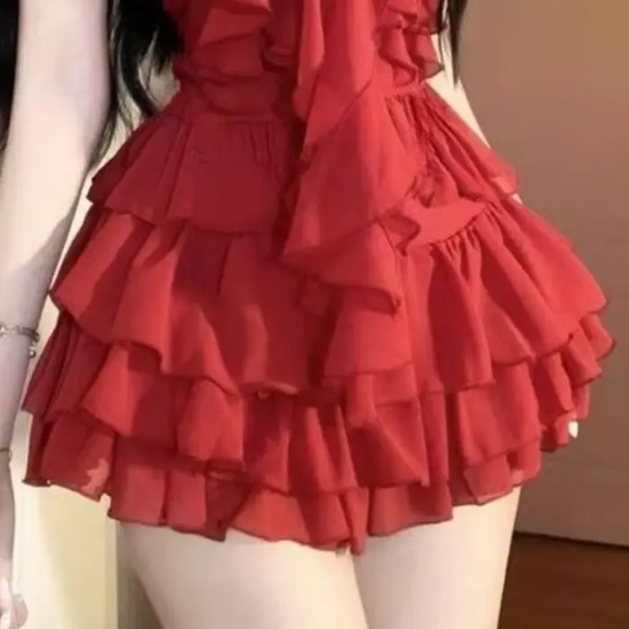 Sexy à volants coupe ajustée licou femmes hauts Mini jupe 2 pièces ensemble fille chaude Style Desig
