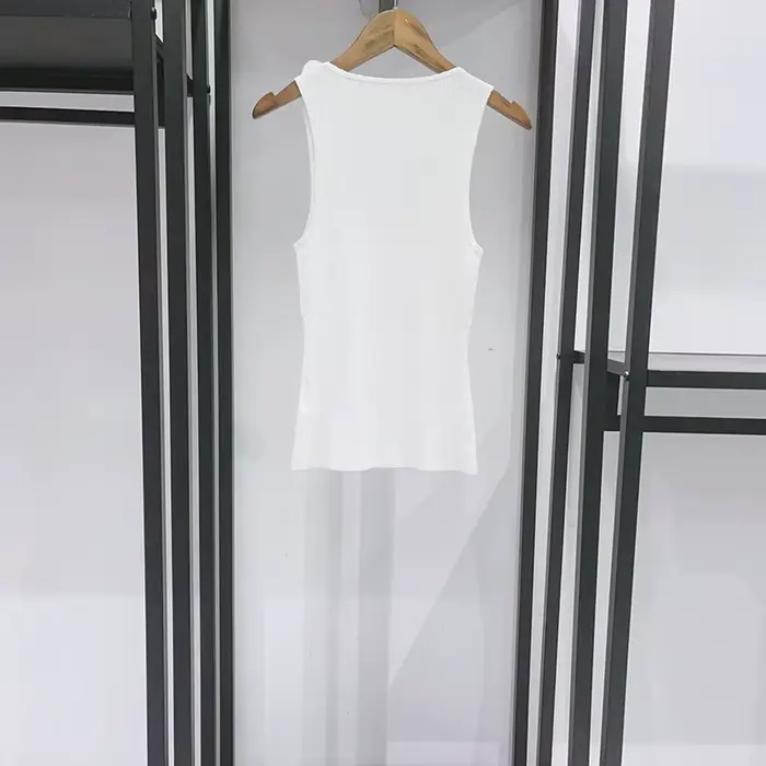 Jupe asymétrique à volants irréguliers pour femme ou gilet en maille ajusté à col en U avec garniture florale tridimensionnelle Printemps-Été 2026