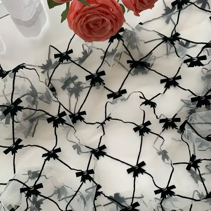 Lolita – tissu en dentelle avec nœud noir