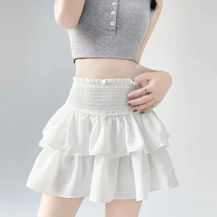 Jupe mini trapèze blanche grande taille pour femme, design estival amincissant, jupe à volants, pour