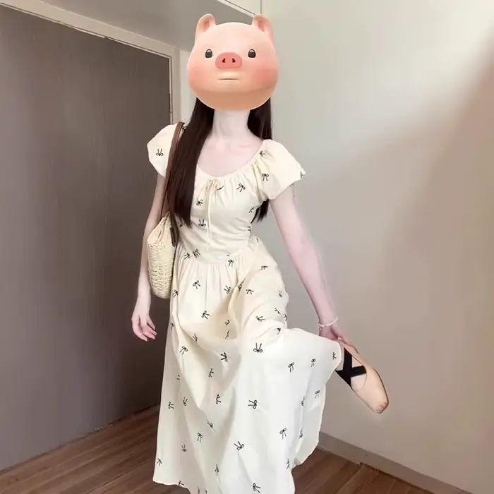 Robe longue imprimée nœud français pour femme été 2026 style à la française coupe trapèze manches bouffantes occasion spéciale vacances