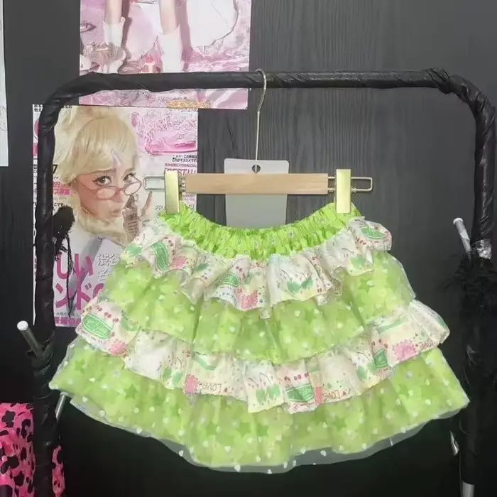 Mini-jupe mignonne pour femme avec nœud, style coréen Lolita, imprimé fraise, volants, punk, style g