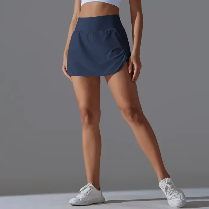 Jupe-short de tennis pour femmes avec poches, respirante et polyvalente pour yoga, badminton, golf et entraînement sportif