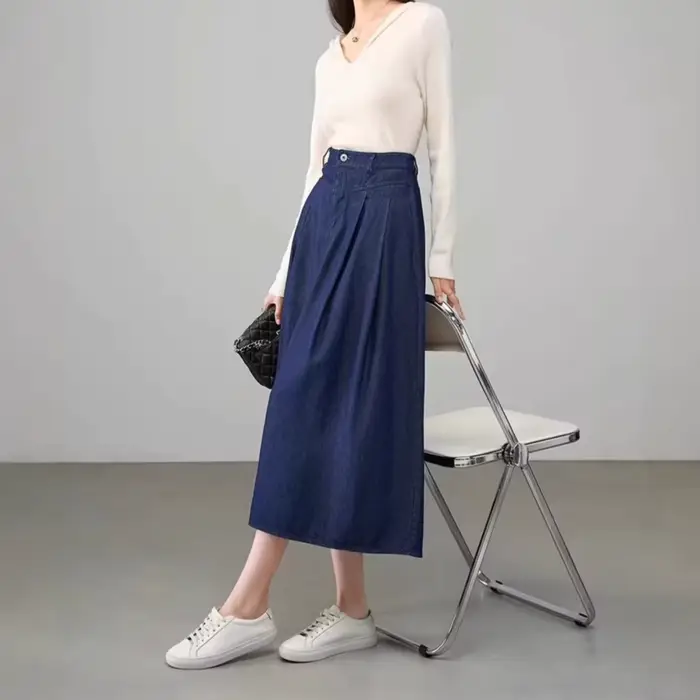 Jupe mi-longue élégante en denim plissée avec poches