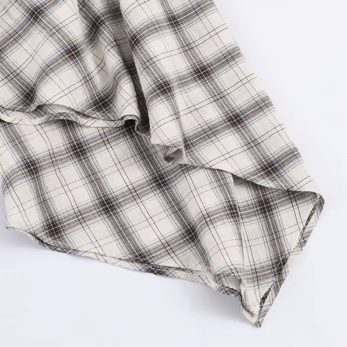 TFAFXY Nouvelle Collection Printemps 2026 Jupes Femme Chic et Élégantes à Carreaux Asymétriques Coupe Trapèze