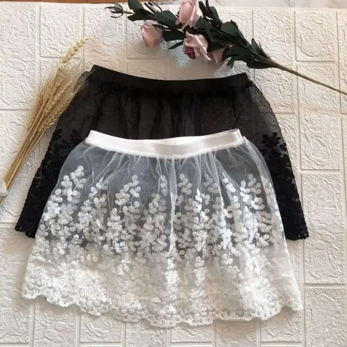 Jupon court taille haute en dentelle transparente brodé de fleurs pour femme