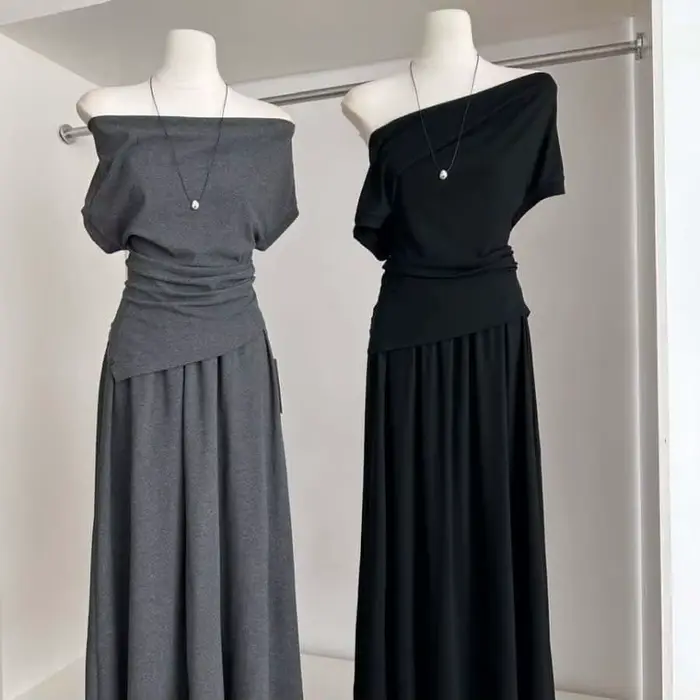 Ensemble deux pièces style coréen pour femme : haut asymétrique et jupe midi taille haute